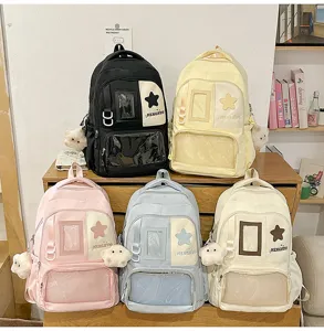 Joli sac à dos ita esthétique avec fenêtre transparente et patch étoile pour l'utilisation scolaire.