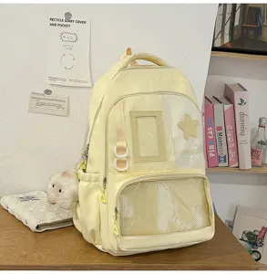 Sac à dos d'école mignon jaune clair avec poche en filet et écusson étoile