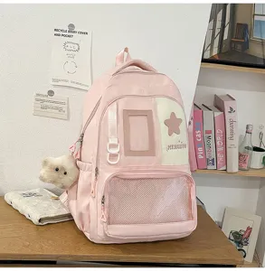 Sac à dos scolaire rose style campus grande capacité avec poche avant en filet et ours peluche.