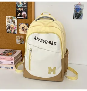 Detailansicht des modischen Kontrastfarben-Studentenrucksacks, große Kapazität für den Schulalltag.