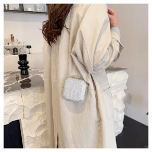Mini borsa a tracolla in rete per donna, squisita borsetta per rossetto e cuffie, stile chic.