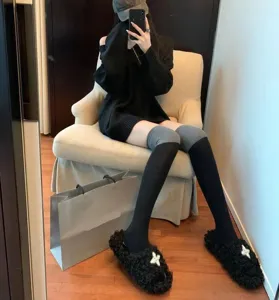 Japanese style JK color block over the knee socks detail view for younger women.