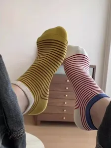 Detail view of women's striped short cotton socks, comfortable casual boat sock design.