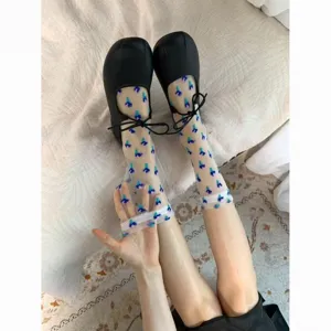 Sheer mesh mid-tube socks featuring delicate blue floral pattern, perfect for spring summer.