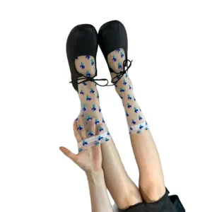 Sheer floral mid-tube socks for women, trendy transparent mesh spring summer hosiery.
