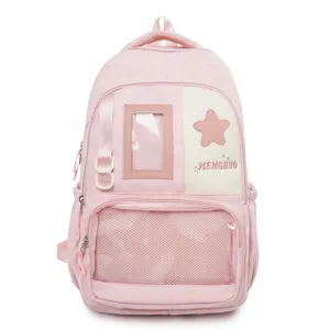 Joli sac à dos rose ita avec fenêtre transparente et poche en filet, idéal pour les élèves.