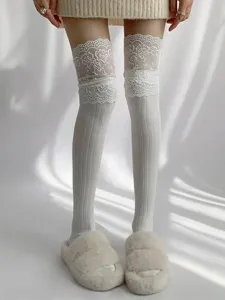 White lace over-the-knee socks with delicate floral lace trim for women winter fashion