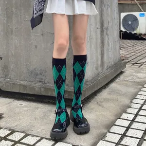 Fashionable black and green argyle knee high socks for women, preppy style JK stockings.