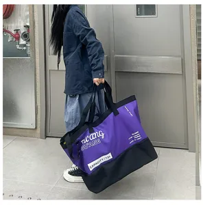 Large capacity color-block travel gym tote bag with shoulder strap for outdoor activities.