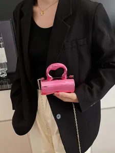Glossy PVC cylinder handbag for women, trendy mini shoulder crossbody bag with chain strap.