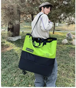 Large capacity colorblock wheeled duffel bag for outdoor travel, fitness and yoga use.