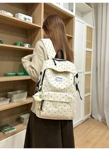Süßer Pünktchen Rucksack für Schüler, stylischer Canvas Tagesrucksack mit Mondanhänger.