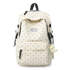 Süßer Polka-Dot Rucksack für Mädchen, süße Schultasche mit Mond-Anhänger für den Alltag.