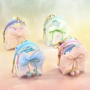 Holographic mini backpack keychain coin purse with mesh bow, cute bag pendant accessory.