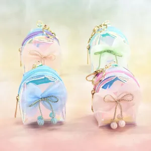 Holographic transparent mini backpack keychain with cute tulle bow and pearl pendant for keys.