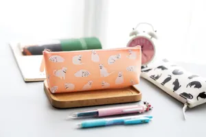 Cute cat silicone pencil case detail view, soft kawaii stationery storage bag for kids.