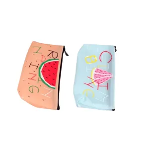 Cute triangular silicone pencil case with fruit pattern, durable student stationery pouch.