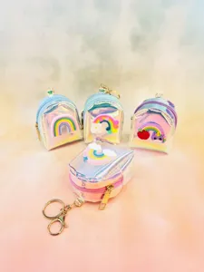 Holographic laser mini coin purse detail showcasing cute rainbow and cloud cartoon charms.