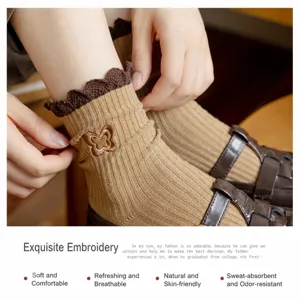 Retro brown mid-calf socks for women featuring lace ruffle cuffs and cute embroidered butterfly.