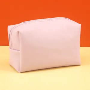 Pink cosmetic bag for daily makeup storage, portable travel makeup pouch with zipper.