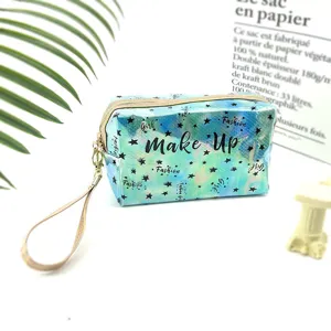 Holographic PVC waterproof cosmetic bag with star pattern, large capacity makeup pouch.