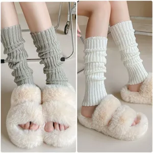 Knit leg warmers and plush furry slippers set, cozy winter warm fashion accessories.