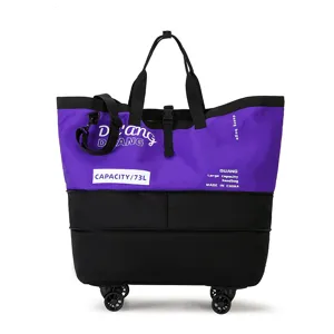 Large capacity color-block wheeled travel duffel bag with shoulder strap and durable handles.