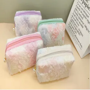 Colorful fluffy lace cosmetic bag with zipper and pearl pendant for daily storage use.