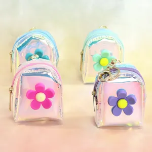Holographic mini backpack coin purse with cute flower charm keychain for girls.