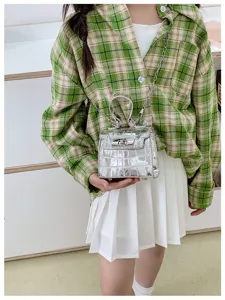 Detailed view of the silver metallic croc-embossed mini Kelly shoulder bag with chain strap.