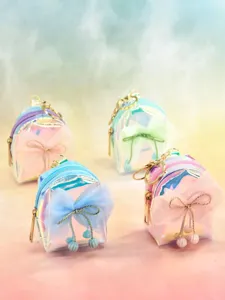 Holographic mini backpack keychain with mesh bow and cute pearl pendant coin purse.