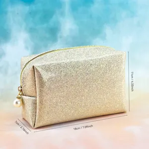 Glitter cosmetic bag for women, portable sparkly makeup storage pouch with pearl zipper pull.