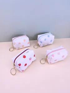 Cute waffle strawberry coin purse mini lipstick storage bag with metal keychain for daily use.