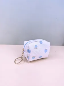 White waffle fabric coin purse featuring cute blue fruit pattern and handy gold keyring.