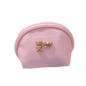 Cute pink cosmetic bag with 3D bear bow, semi-circular PU leather portable makeup coin pouch.