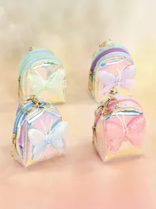 Holographic mini backpack coin purse with bow keychain, cute transparent storage bag for girls.