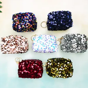 Mini sequin coin purse with key ring for lipstick and small items storage, stylish and portable.
