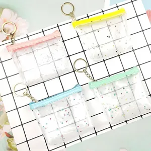 Transparent clear jelly coin purse with colorful zipper and keychain, mini pouch.