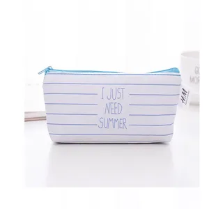 Blue canvas pencil pouch detail, striped design with zipper and summer theme text.