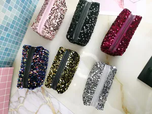 Stylish sequin cosmetic bag set featuring durable zipper closure and vibrant colors for travel.