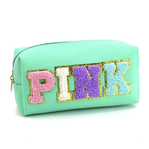 Mint green cosmetic bag with fuzzy chenille PINK letters, stylish zipper storage pouch.