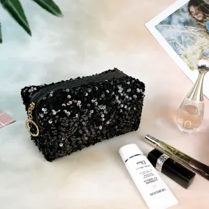 Black sequin cosmetic bag for women, sparkling travel makeup pouch with zipper and stylish ring.