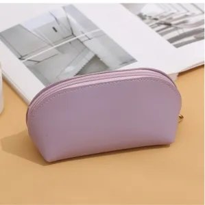 Simple double-sided leather cosmetic bag, solid color portable shell storage pouch.