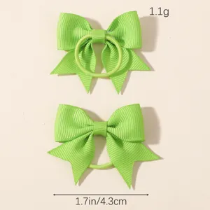 Set van groene zwaluwstaart strik haarelastiekjes kinderen, schattige effen haaraccessoires.