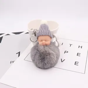 Süßes schlafendes Puppen-Bommel-Schlüsselanhänger, Plüschpuppen-Taschenanhänger Detail Ansicht.