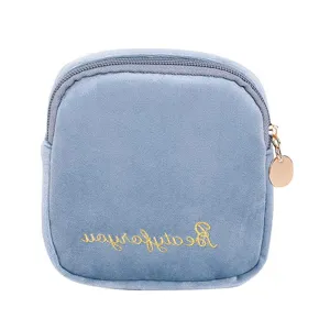 Blue velvet sanitary napkin pouch, soft cosmetic storage bag with cute golden embroidery.
