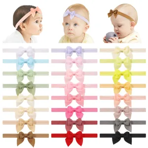 Details of cute baby bow headbands in various macaron colors, soft elastic band for comfort.
