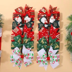 Set of festive Christmas boutique bow hair clips for children with holiday patterns.