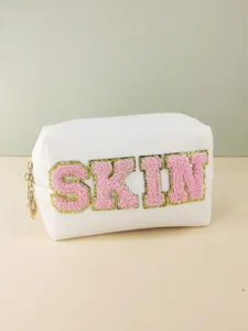 White PU leather cosmetic bag with pink chenille SKIN letters and gold glitter trim for women