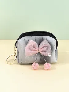 Mini cute coin purse for women with bow decoration, zipper closure and metal keychain ring.